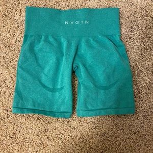 NVGTN shorts. Small. Teal color.